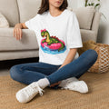 Cute Dinosaur Tee — Green Dino in Pink Pool Float Graphic T-Shirt